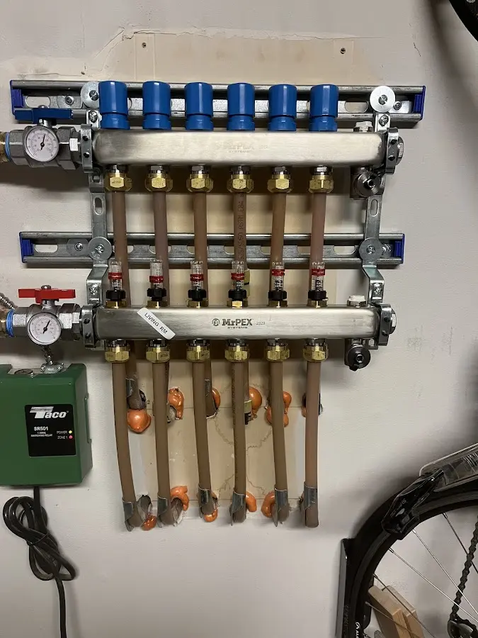 Plumber performing Water Heater Repair at a residential property in Scranton